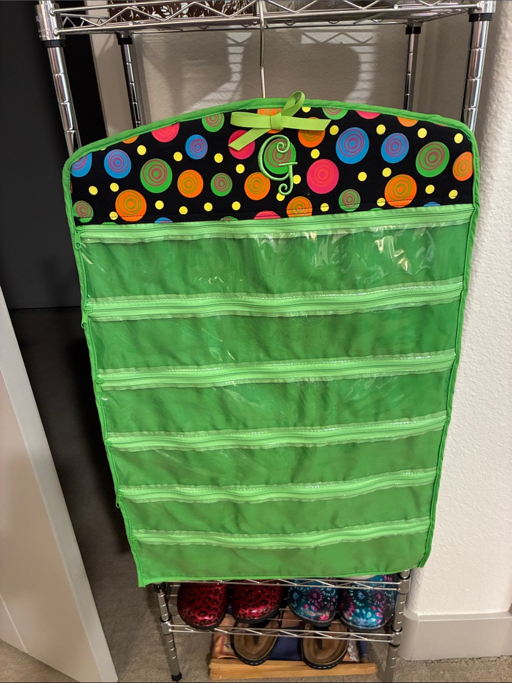 Green Jewelry Hanging Organizer with Colorful Polka Dot Accent and 12 pockets
